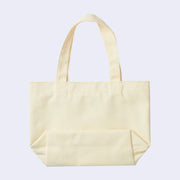 Backside of cream colored canvas tote bag, blank.