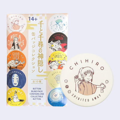 Blind bag of tin buttons with designs from Spirited Away, each pin representing a different character or scene.