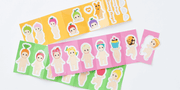 Group of stickers, all of Sonny Angel Kewpie babies in the nude and wearing a food themed hood hat.