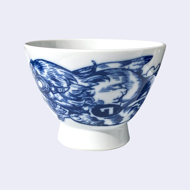 White ceramic bowl with a large rounded base that extends out slightly. A dark blue line illustration of a bird is on the bowl, its body is feathery and has the number "7" written on its side.