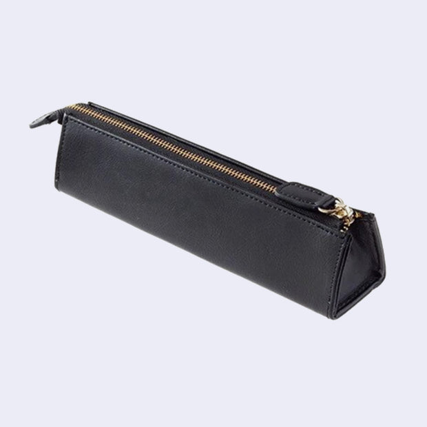 Black synthetic leather exterior pen case, in a triangular shape with a zipper top.