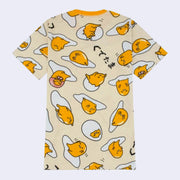 Yellow t-shirt with a repeating all over pattern of Gudetama, sitting on egg yolk, inside of an egg shell or wrapped in bacon.