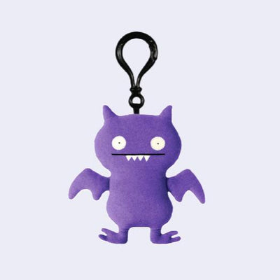 Clip on keychain of Uglydoll's Ice Bat in purple.