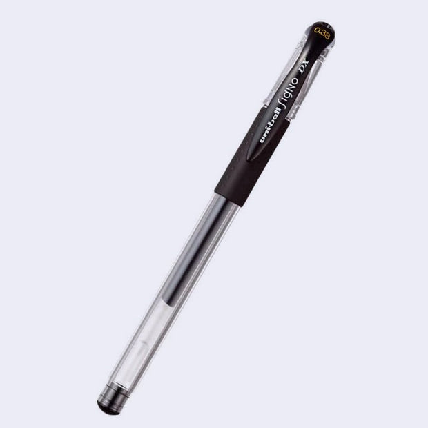 Clear bodied black ink pen with a rubber grip and writing on the pen cap that reads "uni-ball signo DX"