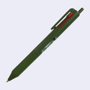 Olive green ballpoint click pen with 3 ink colors: the main click is black, and 2 side sliding clicks are blue and red.