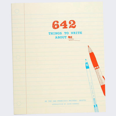 Book cover, cream colored with a vertical red line and many horizontal blue lines, like a sheet of notebook paper. "642 Things to Write About Me" is written in stylized font in upper center. An illustration of a red and blue pen are in the bottom right.