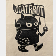 Close up of cream colored canvas tote bag with a design of Big Boss Robot walking and holding a pennant shaped flag that says "Giant Robot," some of the letters obscured as a flag ripple effect.