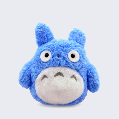 Small blue plush of a Totoro with large cute eyes and a round body.