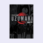 "Uzumaki" book cover, a black cover with a negative photo effect of illustrations of a group of uniformed figures. 