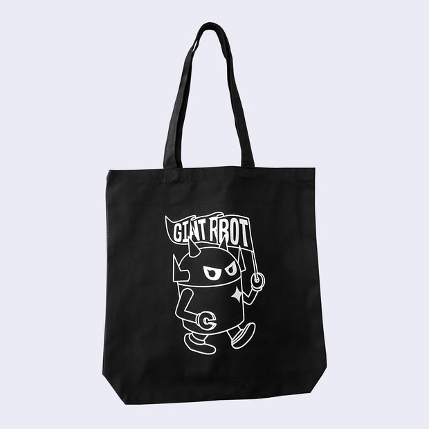  Black canvas tote bag with drop handle. On the front is a white design of Big Boss Robot walking and holding a pennant shaped flag that says "Giant Robot," some of the letters obscured as a flag ripple effect.