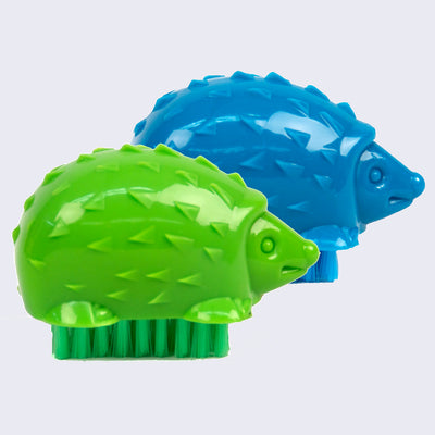 2 plastic hedgehogs (one blue, one green) with brushes attached to the underside of their body for cleaning nails or hands.