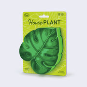 Kitchen sponge designed like a monstera leaf, all green with leaf details. Its on a green backing card that reads "House Plant"