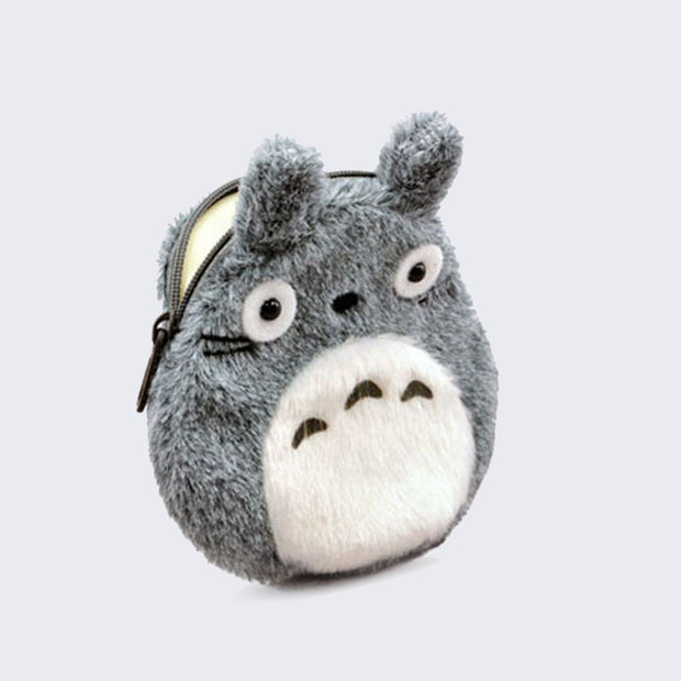 Plush coin pouch with a zipper top, designed to look like Totoro from My Neighbor Totoro with no mouth and an oval shaped body.